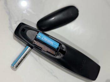 Replacing AA batteries in DStv remote control Nigeria 2026