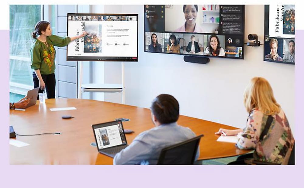 Business team participating in a professional video conference call in a modern meeting room
